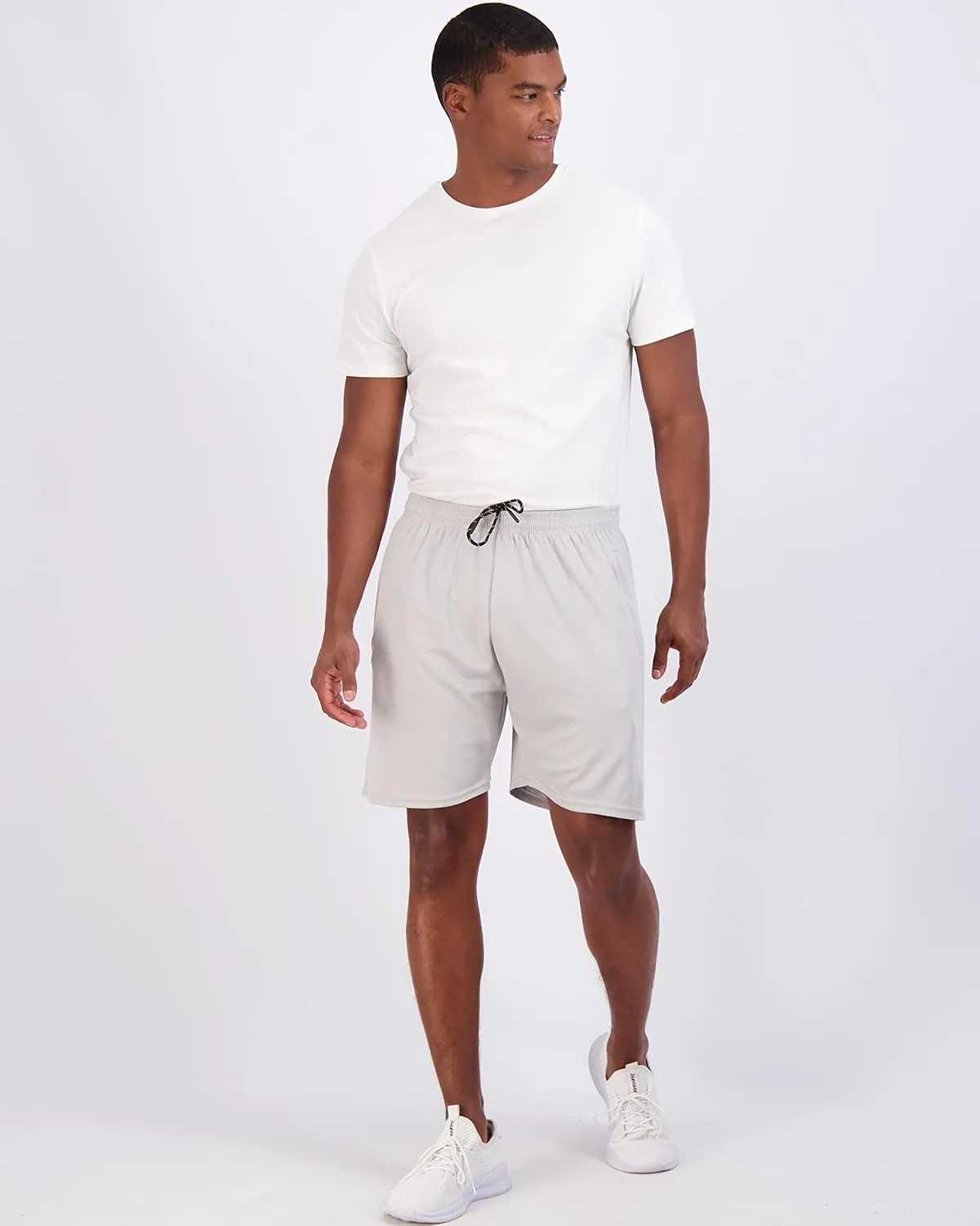 Real Essentials 4 Pack: Men's 7" Athletic Running Quick Dry Mesh Shorts with Zipper Pockets (Available in Big & Tall)